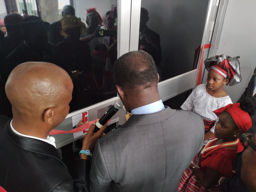 Pastor Biyi unveiling Reinging King Parish